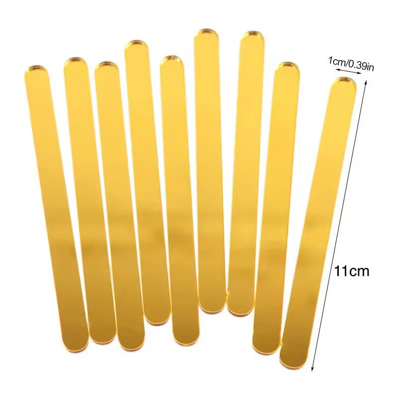 50 palitos acrílicos Dorados